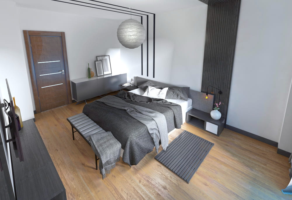 Aménagement chambre moderne : une chambre avec un lit double aux draps gris, un sol en bois clair, un mur à lattes foncées et un grand lustre en papier.